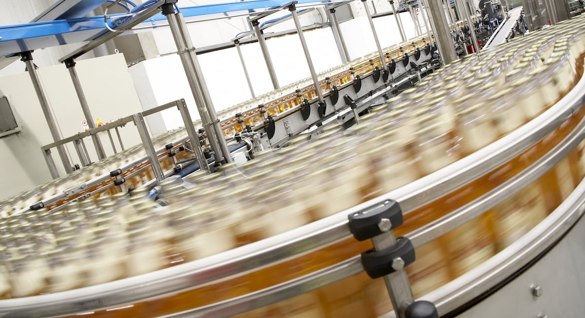 close-up of beverage bottling line